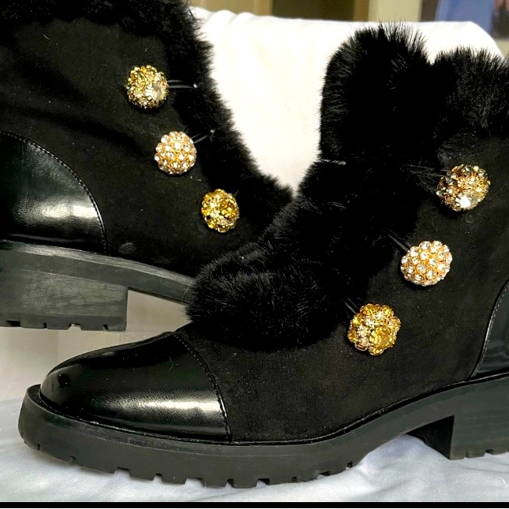 Stay warm in high fashion!!! Nanette boot - size 7